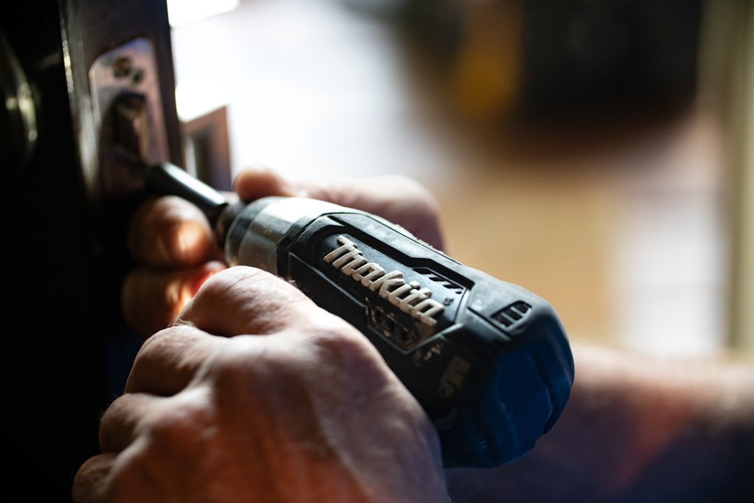 selective-focus-photography-blue-and-black-makita-power-drill-klby0nxsey8